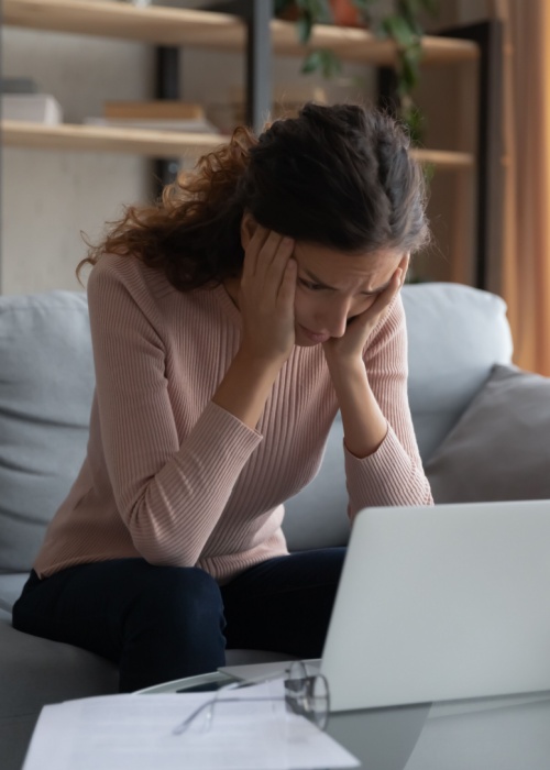 Stressed overworked young female