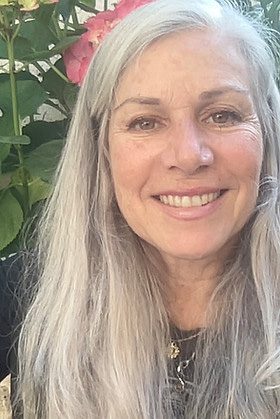 Laurie De Santis-Staschik, Certified massage therapist