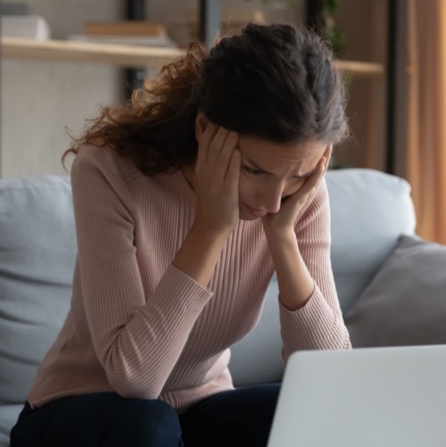 Stressed overworked young female