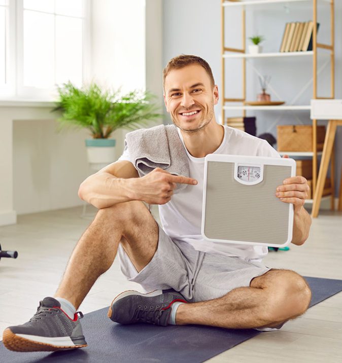 Young man happy with his results after Summit Health Group medical weight loss program